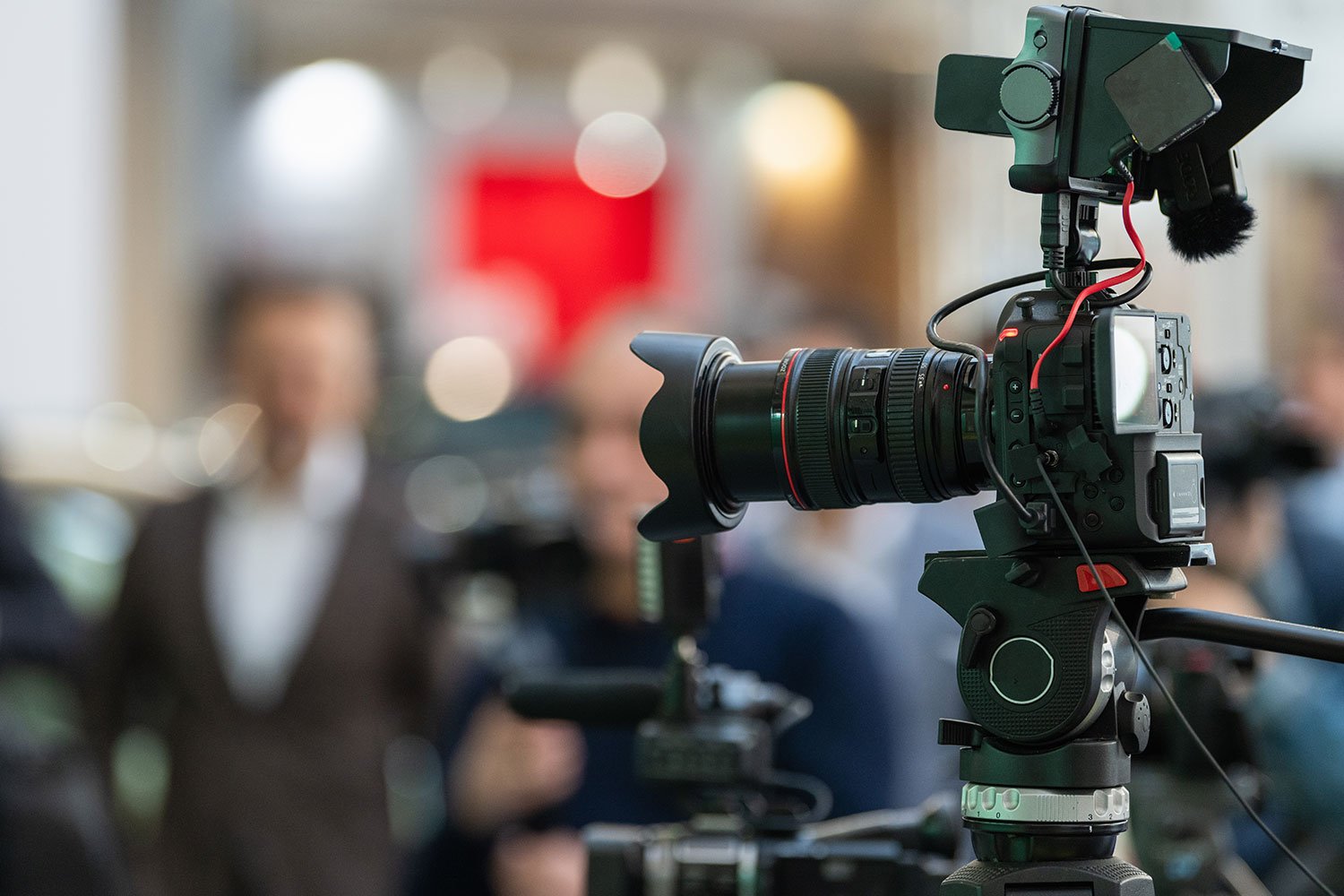 Photographer capturing the essence of a television commercial shoot